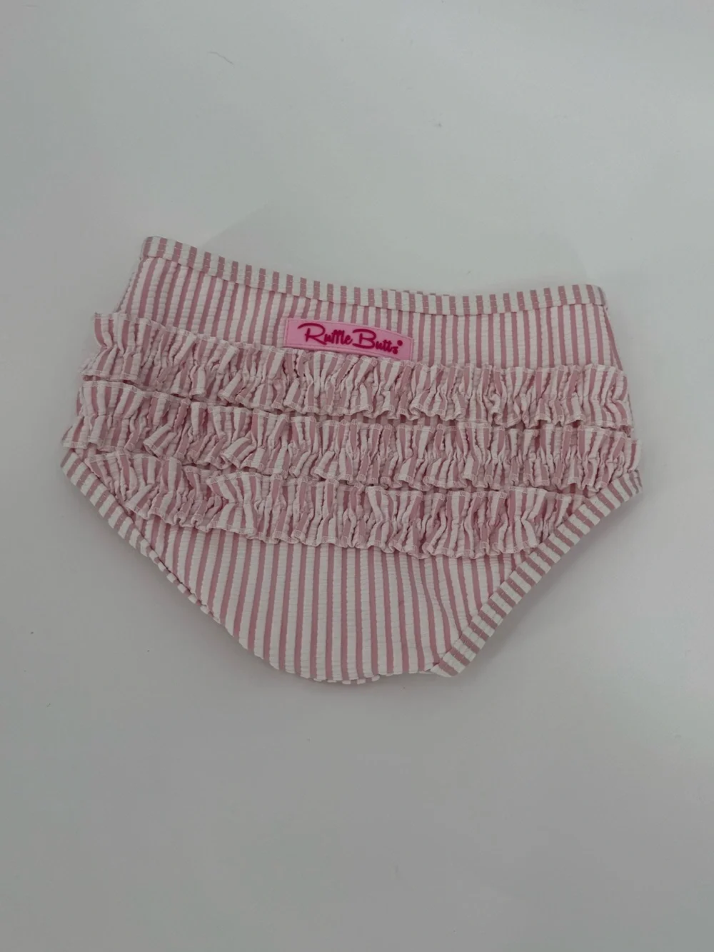 RuffleButts Girls Seersucker Ruffle Swim Bottom | Pink Stripe | 3T